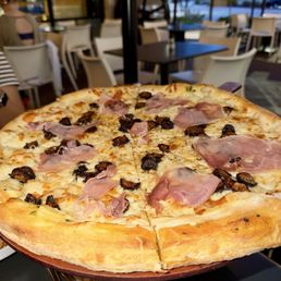 The Grove Wine Bar & Kitchen - Cedar Park signature dishes Thin-Crust Pizza
New American Eats
Locally Sourced Salads